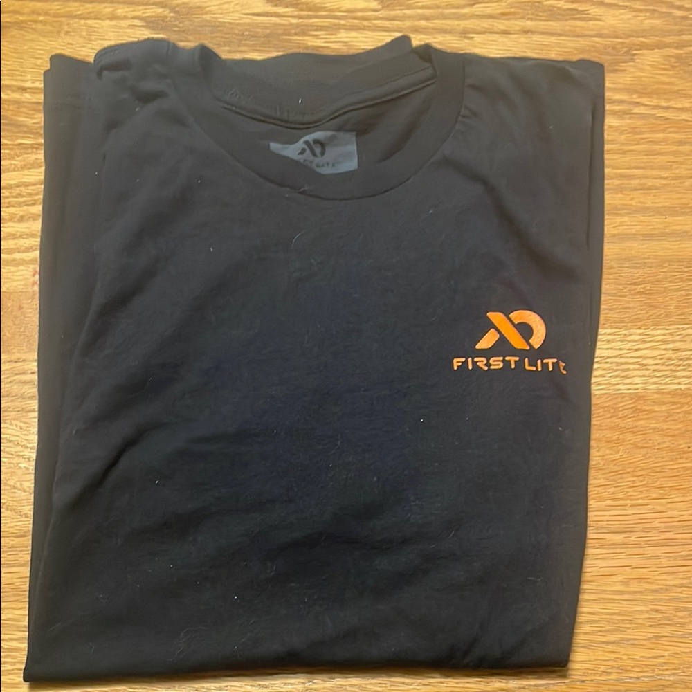 First Lite Black and Orange Short Sleeve Tee (Never worn as is wrong size)
